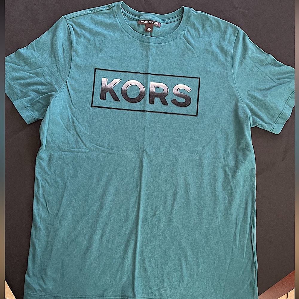 Blue MK shirt with design on front large
